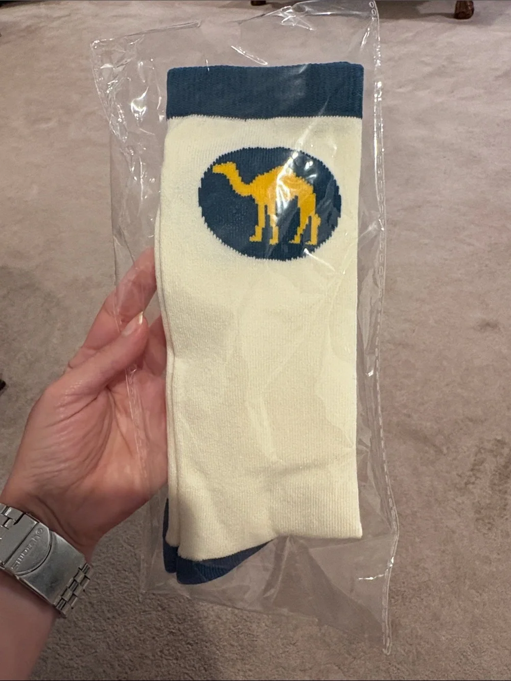 Root One Cream Colored Socks with Yellow Camel Logo